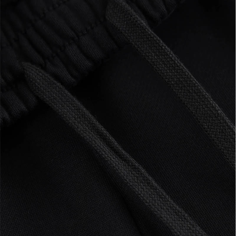 MULTIPLE CROSS LEATHER PATCH LOOSE FIT SWEAT PANTS -BLACK-